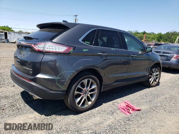 2015 Ford Edge Titanium z VIN 2FMPK4K8XFBB98334, wystawiony jako Copart lot #56953495 z przebiegiem 110 129 mil mil oraz Szkody całkowita. Historia ofert i sprzedaży dostępna na DreamBid. Obrazek 3.