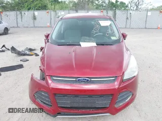 2014 Ford Escape SE z VIN 1FMCU0GX3EUC64328, wystawiony jako IAAI lot #42182502 z przebiegiem 135 496 mil mil oraz . Historia ofert i sprzedaży dostępna na DreamBid. Obrazek 12.