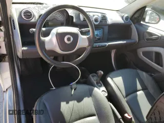 2013 Smart fortwo Pure z VIN WMEEJ3BA5DK694853, wystawiony jako Copart lot #74003734 z przebiegiem 27 720 mil mil oraz Szkoda całkowita • Salvage title. Historia ofert i sprzedaży dostępna na DreamBid. Obrazek 8.