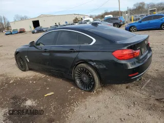 2016 BMW 4 Series 428i xDrive with VIN WBA4C9C59GG136078, listed as a Copart auction lot 49689895 with 143,135 mi miles and Salvage Title. Bid and sale history available at DreamBid. Image 2.