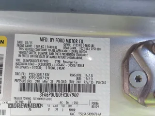 2015 Ford Fusion S Hybrid with VIN 3FA6P0UU0FR307900, listed as a IAAI auction lot 41507112 with 150,257 mi miles. Bid and sale history available at carsss.com. Image 9.