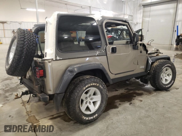 2004 Jeep Wrangler Rubicon z VIN 1J4FA69S44P784141, wystawiony jako Copart lot #55235305 z przebiegiem 125 564 mil mil oraz Szkoda całkowita • Salvage title. Historia ofert i sprzedaży dostępna na DreamBid. Obrazek 3.