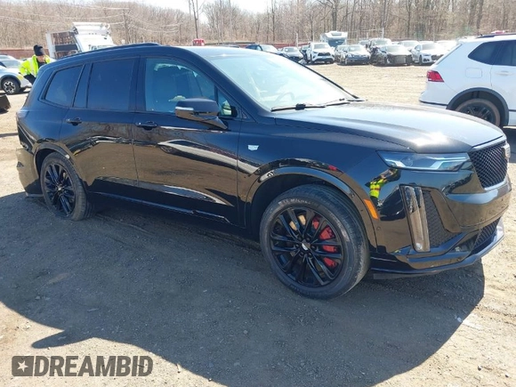 2022 Cadillac XT6 Sport with VIN 1GYKPGRS3NZ143717, listed as a IAAI auction lot 41758715 with 49,083 mi miles. Bid and sale history available at carsss.com. Image 1.