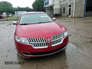 2012 Lincoln MKZ z VIN 3LNHL2GC1CR839595, wystawiony jako Copart lot #57206445 z przebiegiem 155 915 mil mil oraz Szkoda całkowita • Salvage title. Historia ofert i sprzedaży dostępna na DreamBid. Obrazek 13.