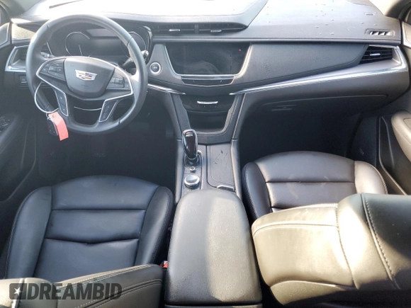 2022 Cadillac XT5 FWD Luxury z VIN 1GYKNAR47NZ100986, wystawiony jako Copart lot #83144574 z przebiegiem Nie podano mil oraz Nie do naprawy • Non repairable. Historia ofert i sprzedaży dostępna na DreamBid. Obrazek 8.