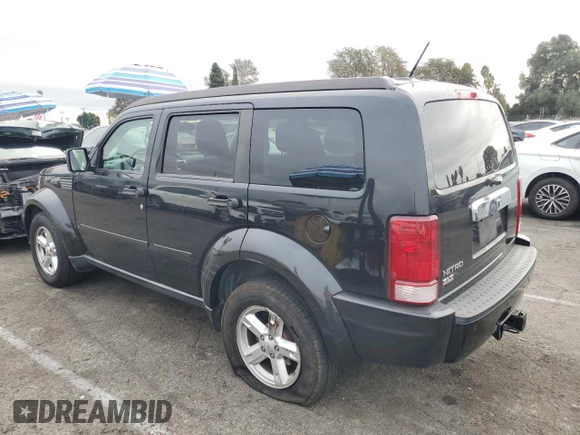 2008 Dodge Nitro SLT with VIN 1D8GT58K78W117240, listed as a Copart auction lot 82433244 with 245,392 mi miles and Salvage Title. Bid and sale history available at DreamBid. Image 2.