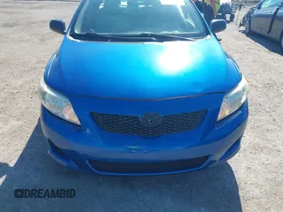 2009 Toyota Corolla with VIN JTDBL40E999021523, listed as a IAAI auction lot 42019856 with 194,011 mi miles. Bid and sale history available at carsss.com. Image 13.