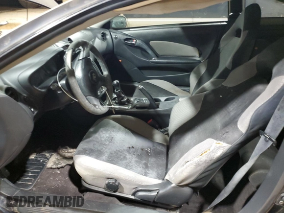 2003 Toyota Celica GT z VIN JTDDR32T130160537, wystawiony jako Copart lot #43136865 z przebiegiem 138 796 mil mil oraz Czysty tytuł • Clean title. Historia ofert i sprzedaży dostępna na DreamBid. Obrazek 7.