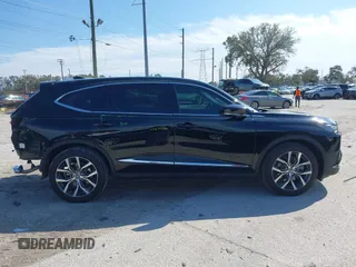 2023 Acura MDX w/Technology Package with VIN 5J8YD9H46PL001876, listed as a IAAI auction lot 41309678 with 39,596 mi miles. Bid and sale history available at carsss.com. Image 14.