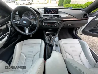 2015 BMW M4 z VIN WBS3R9C58FK332532, wystawiony jako Copart lot #59045225 z przebiegiem 127 199 mil mil oraz Tytuł czysty. Historia ofert i sprzedaży dostępna na DreamBid. Obrazek 9.