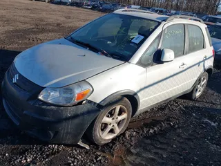 2009 Suzuki SX4 Man AWD with VIN JS2YB413196201614, listed as a IAAI auction lot 41437522 with Not Provided miles. Bid and sale history available at carsss.com. Image 2.