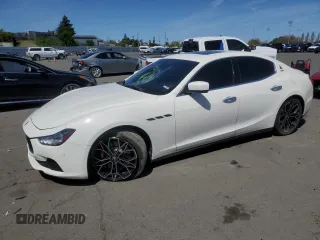 2015 Maserati Ghibli S Q4 with VIN ZAM57RTA4F1134471, listed as a Copart auction lot 51932645 with 101,748 mi miles and Non Repairable. Bid and sale history available at carsss.com. Image 1.