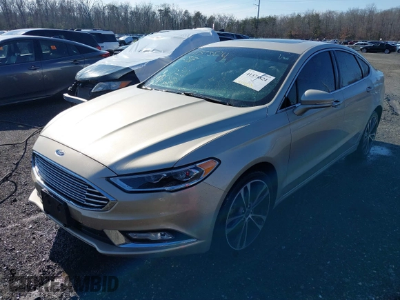2017 Ford Fusion Titanium with VIN 3FA6P0K91HR309740, listed as a IAAI auction lot 41373824 with 95,499 mi miles and . Bid and sale history available at DreamBid. Image 18.