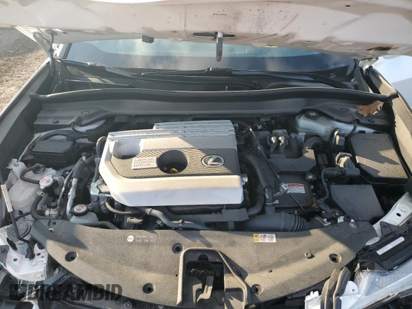 2022 Lexus UX 250h с VIN JTHP9JBH2N2057808, выставлен на аукционе Copart как лот 80897274 с пробегом 22 515 миль миль и Списание • Salvage title. История ставок и продаж доступна на DreamBid. Изображение 12.