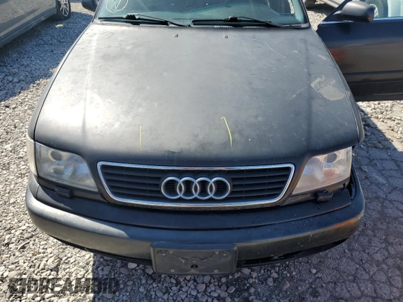 1997 Audi A6 z VIN WAUGA84A4VN006453, wystawiony jako Copart lot #47408094 z przebiegiem 333 651 mil mil oraz Szkoda całkowita • Salvage title. Historia ofert i sprzedaży dostępna na DreamBid. Obrazek 11.