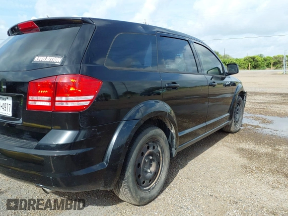 2014 Dodge Journey SE with VIN 3C4PDCAB7ET116651, listed as a IAAI auction lot 42762513 with 197,808 mi miles and . Bid and sale history available at DreamBid. Image 4.