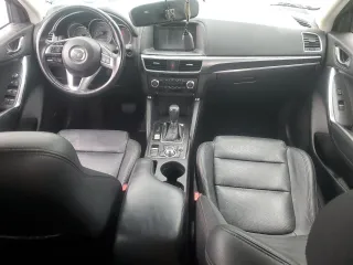 2016 Mazda CX-5 Grand Touring with VIN JM3KE4DYXG0711367, listed as a Copart auction lot 52862405 with 87,870 mi miles and Salvage Title. Bid and sale history available at DreamBid. Image 8.