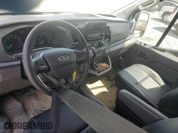 2024 Ford Transit Cargo with VIN 1FTYE1Y83RKA09653, listed as a Copart auction lot 50869985 with 5,549 mi miles and Salvage Title. Bid and sale history available at DreamBid. Image 8.