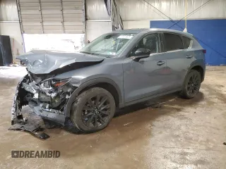 2023 Mazda CX-5 S Carbon Edition z VIN JM3KFBCMXP0272199, wystawiony jako Copart lot #57031525 z przebiegiem 93 233 mil mil oraz Szkoda całkowita • Salvage title. Historia ofert i sprzedaży dostępna na DreamBid. Obrazek 1.