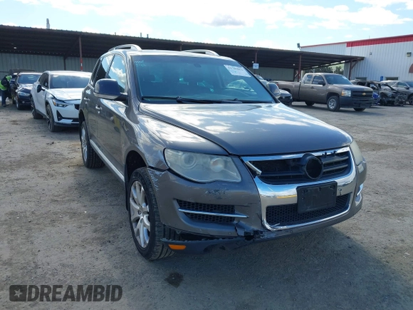 2010 Volkswagen Touareg VR6 with VIN WVGBF7A96AD002466, listed as a IAAI auction lot 41709052 with 204,819 mi miles and . Bid and sale history available at DreamBid. Image 6.