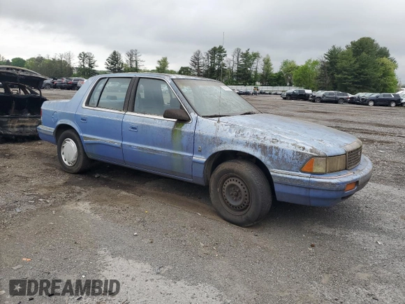 1991 Plymouth Acclaim z VIN 1P3XA4633MF523214, wystawiony jako Copart lot #55908665 z przebiegiem 90 332 mil mil oraz Tytuł czysty. Historia ofert i sprzedaży dostępna na DreamBid. Obrazek 4.
