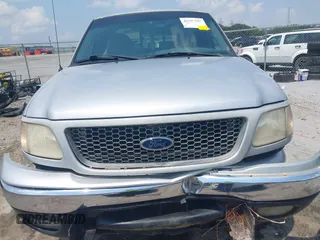 2000 Ford F-150 XL with VIN 1FTRX18L1YNA13975, listed as a IAAI auction lot 42397187 with 235,471 mi miles and . Bid and sale history available at DreamBid. Image 12.