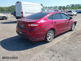 2015 Ford Fusion SE with VIN 1FA6P0H73F5123218, listed as a IAAI auction lot 42010665 with 185,309 mi miles. Bid and sale history available at carsss.com. Image 4.