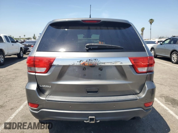 2012 Jeep Grand Cherokee Laredo with VIN 1C4RJEAG0CC104004, listed as a Copart auction lot 53734675 with 150,216 mi miles and Salvage Title. Bid and sale history available at carsss.com. Image 6.