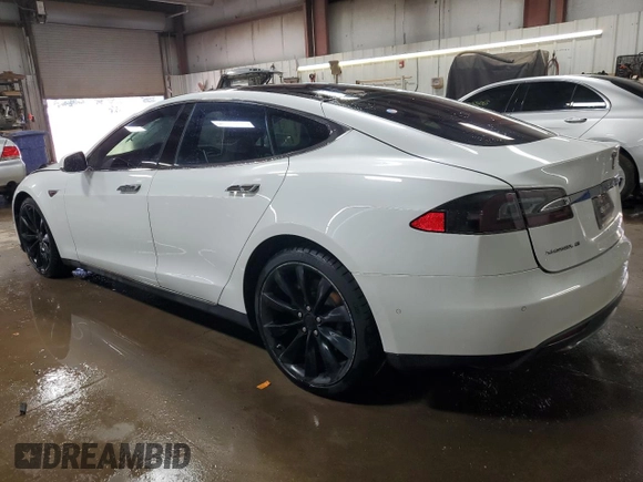 2015 Tesla Model S 85D with VIN 5YJSA1H24FF092628, listed as a Copart auction lot 51959035 with 128,744 mi miles and Salvage Title. Bid and sale history available at carsss.com. Image 2.