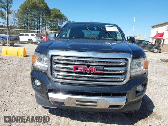 2015 GMC Canyon 2WD SLT with VIN 1GTG5CE35F1249224, listed as a IAAI auction lot 41697796 with 180,230 mi miles. Bid and sale history available at carsss.com. Image 12.