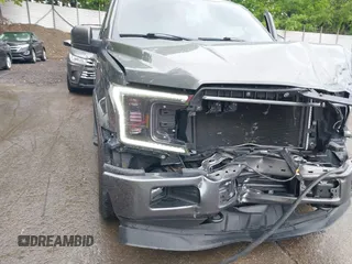 2019 Ford F-150 XL with VIN 1FTEX1EP1KFA77120, listed as a IAAI auction lot 42329608 with 76,053 mi miles and . Bid and sale history available at DreamBid. Image 20.