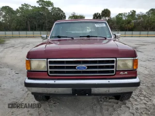 1990 Ford Bronco Custom with VIN 1FMEU15H2LLA70449, listed as a Copart auction lot 77953604 with 12,519 mi miles and Salvage Title. Bid and sale history available at carsss.com. Image 5.