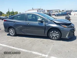 2021 Toyota Prius LE with VIN JTDKAMFPXM3170372, listed as a IAAI auction lot 42661609 with 47,977 mi miles and . Bid and sale history available at DreamBid. Image 13.