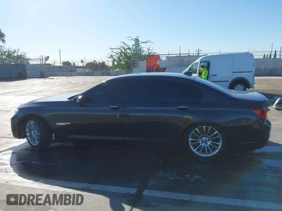2015 BMW 7 Series 750Li with VIN WBAYE8C52FD780902, listed as a IAAI auction lot 40808265 with 102,774 mi miles. Bid and sale history available at carsss.com. Image 14.