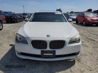 2012 BMW 7 Series 750i xDrive with VIN WBAKC6C56CDX99416, listed as a Copart auction lot 54857715 with 114,198 mi miles and Salvage Title. Bid and sale history available at carsss.com. Image 5.