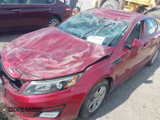 2015 Kia Optima LX z VIN 5XXGM4A75FG503066, wystawiony jako IAAI lot #42007170 z przebiegiem 128 918 mil mil oraz . Historia ofert i sprzedaży dostępna na DreamBid. Obrazek 6.