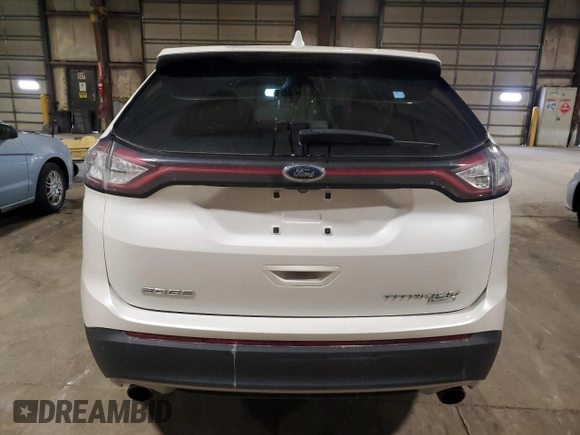 2015 Ford Edge Titanium z VIN 2FMTK3K91FBB08263, wystawiony jako Copart lot #55448405 z przebiegiem 135 788 mil mil oraz Szkoda całkowita • Salvage title. Historia ofert i sprzedaży dostępna na DreamBid. Obrazek 6.