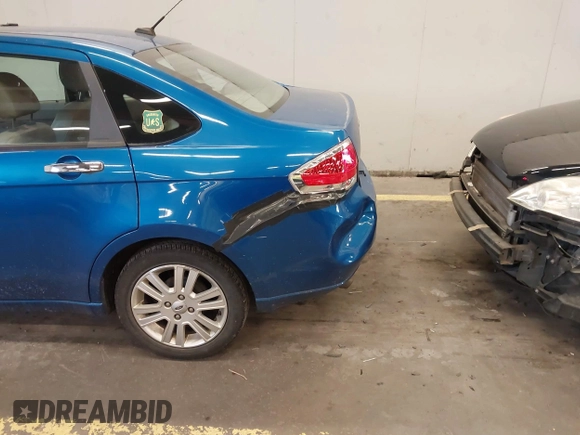 2010 Ford Focus SEL with VIN 1FAHP3HN0AW231260, listed as a IAAI auction lot 41783407 with 204,528 mi miles. Bid and sale history available at carsss.com. Image 6.