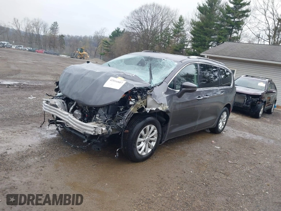 2021 Chrysler Pacifica Touring L with VIN 2C4RC1BG7MR584956, listed as a IAAI auction lot 42016887 with 51,415 mi miles and . Bid and sale history available at DreamBid. Image 19.