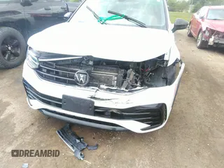 2022 Volkswagen Tiguan SE R-Line Black z VIN 3VVCB7AX0NM029502, wystawiony jako IAAI lot #40141730 z przebiegiem 41 362 mil mil oraz . Historia ofert i sprzedaży dostępna na DreamBid. Obrazek 6.