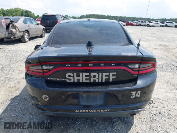 2021 Dodge Charger Police z VIN 2C3CDXAT7MH523170, wystawiony jako IAAI lot #42322244 z przebiegiem 90 825 mil mil oraz . Historia ofert i sprzedaży dostępna na DreamBid. Obrazek 16.
