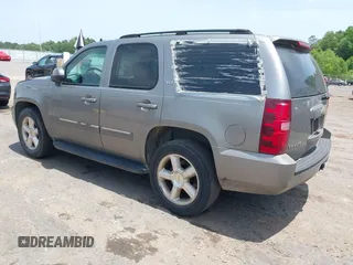 2007 Chevrolet Tahoe LT z VIN 1GNFC130X7R263516, wystawiony jako IAAI lot #42259629 z przebiegiem 215 970 mil mil oraz . Historia ofert i sprzedaży dostępna na DreamBid. Obrazek 3.