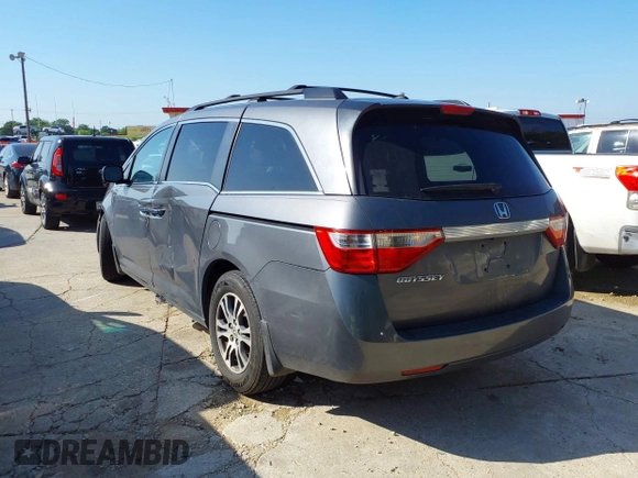 2011 Honda Odyssey EX-L with VIN 5FNRL5H6XBB073482, listed as a IAAI auction lot 42090463 with 213,061 mi miles and . Bid and sale history available at carsss.com. Image 3.
