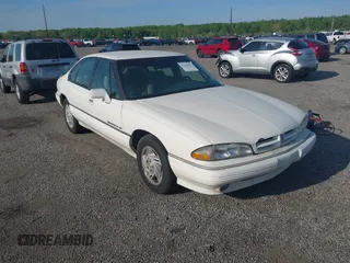 1992 Pontiac Bonneville SE z VIN 1G2HX53L4N1201312, wystawiony jako IAAI lot #42168291 z przebiegiem 271 502 mil mil oraz . Historia ofert i sprzedaży dostępna na DreamBid. Obrazek 1.