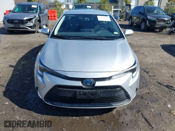 2023 Toyota Corolla Hybrid LE with VIN JTDBCMFE1P3015786, listed as a IAAI auction lot 41887102 with 27,123 mi miles. Bid and sale history available at carsss.com. Image 12.