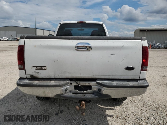 2002 Ford F-350 XL with VIN 1FTSF31L42EA65313, listed as a Copart auction lot 74520824 with 155,237 mi miles and Salvage Title. Bid and sale history available at DreamBid. Image 6.