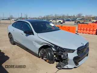 2024 BMW i5 M60 with VIN WBY43FK06RCR67585, listed as a IAAI auction lot 41800984 with 11,279 mi miles and . Bid and sale history available at DreamBid. Image 1.