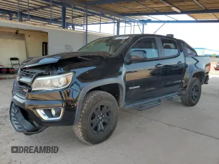2016 Chevrolet Colorado 4WD Z71 with VIN 1GCGTDE33G1201251, listed as a Copart auction lot 64518695 with 123,602 mi miles and Salvage title. Bid and sale history available at DreamBid. Image 1.