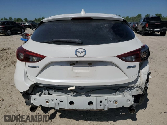 2014 Mazda 3 S Grand Touring z VIN JM1BM1M33E1163458, wystawiony jako Copart lot #52093725 z przebiegiem 141 757 mil mil oraz Szkoda całkowita • Salvage title. Historia ofert i sprzedaży dostępna na DreamBid. Obrazek 6.