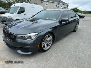 2019 BMW 7 Series 740i xDrive with VIN WBA7E4C55KGV28722, listed as a Copart auction lot 64955445 with 94,901 mi miles and Clean title. Bid and sale history available at DreamBid. Image 1.
